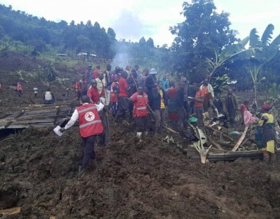 At least 13 killed, many more feared dead as landslides bury Uganda homes