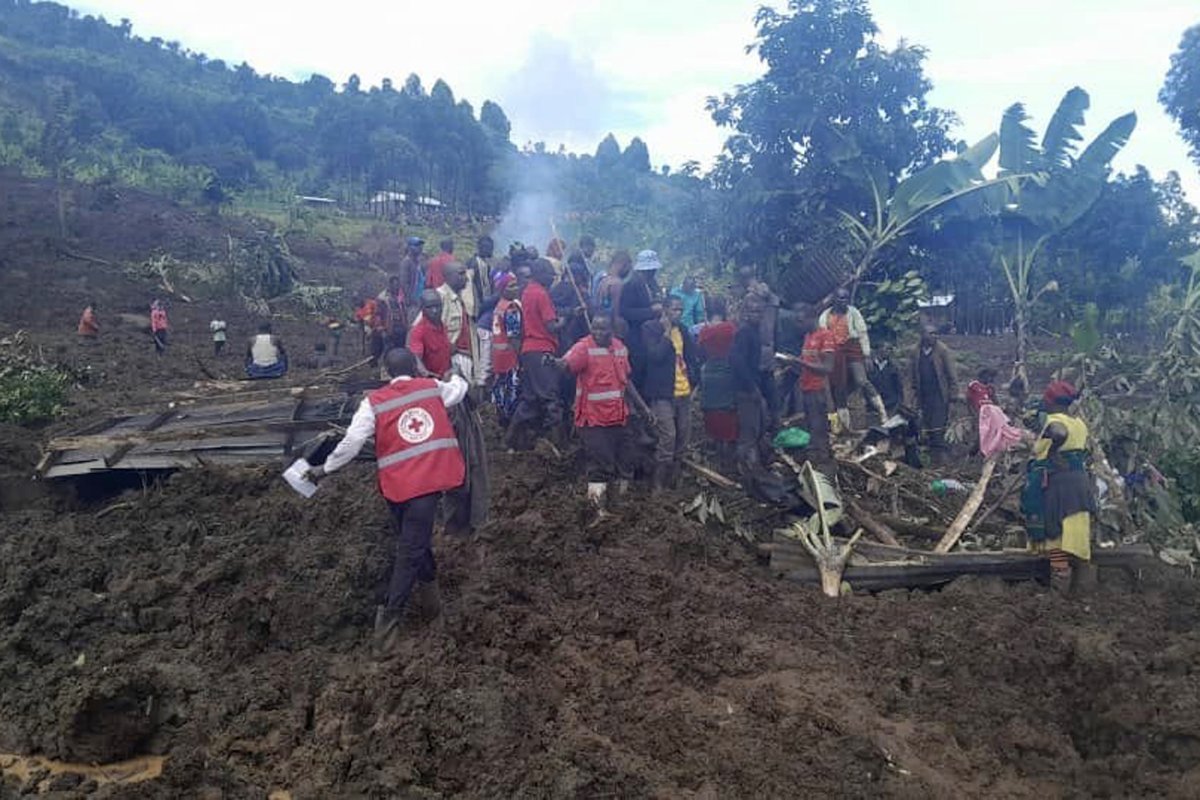 At least 13 killed, many more feared dead as landslides bury Uganda homes