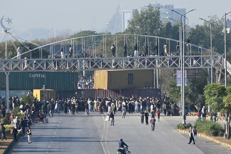 Four security officers killed as Imran Khan supporters storm Islamabad