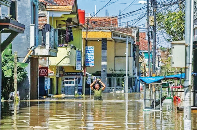 Nearly 1,000 Killed as Devastating Floods Hit Indonesia
